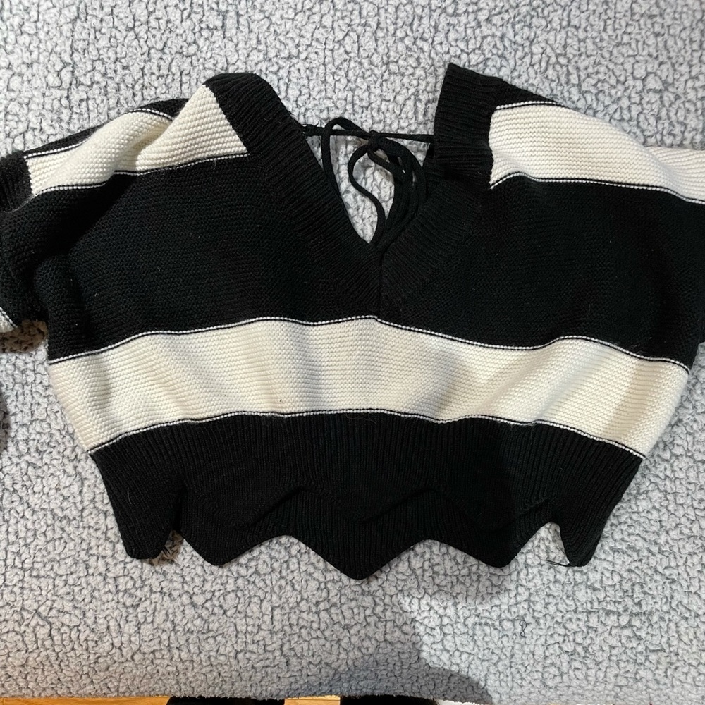 Black and white striped sweater with open back